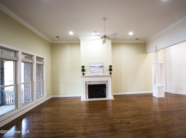 155 Abbington Pl SW, Ocean Isle Beach, NC 28469 - unfurnished living room with ornamental molding, dark wood-type flooring, recessed lighting, baseboards, and a premium fireplace