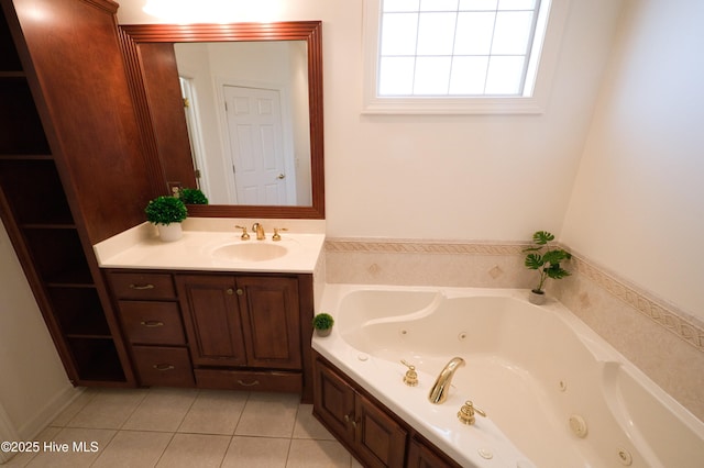 155 Abbington Pl SW, Ocean Isle Beach, NC 28469 - full bath featuring tile patterned flooring, vanity, and a jetted tub