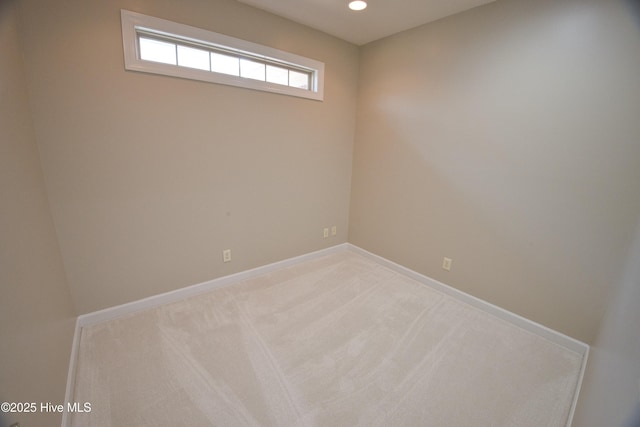 155 Abbington Pl SW, Ocean Isle Beach, NC 28469 - empty room featuring light carpet, recessed lighting, and baseboards
