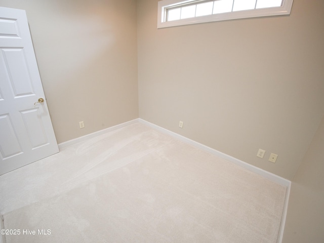 155 Abbington Pl SW, Ocean Isle Beach, NC 28469 - spare room featuring light colored carpet and baseboards