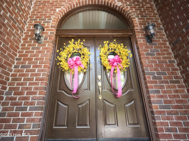 155 Abbington Pl SW, Ocean Isle Beach, NC 28469 - property entrance featuring brick siding