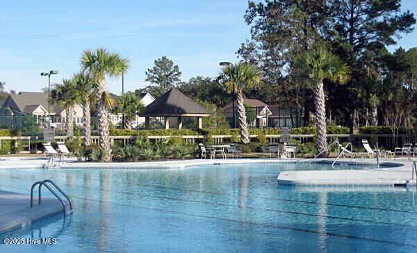 155 Abbington Pl SW, Ocean Isle Beach, NC 28469 - community pool with a patio area