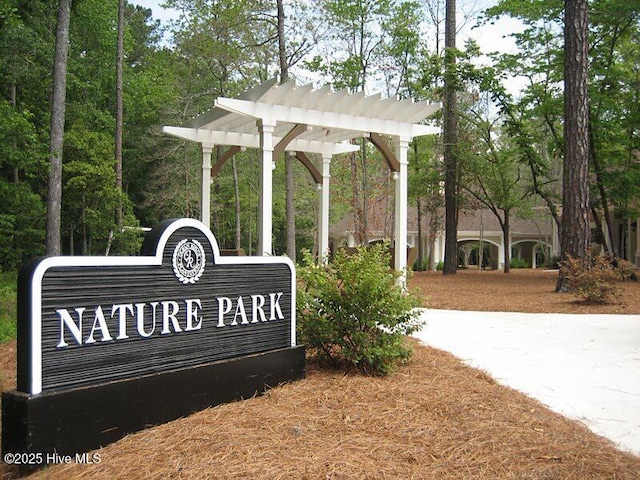 155 Abbington Pl SW, Ocean Isle Beach, NC 28469 - view of community featuring a pergola