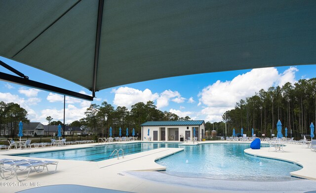 155 Abbington Pl SW, Ocean Isle Beach, NC 28469 - community pool featuring fence and a patio area