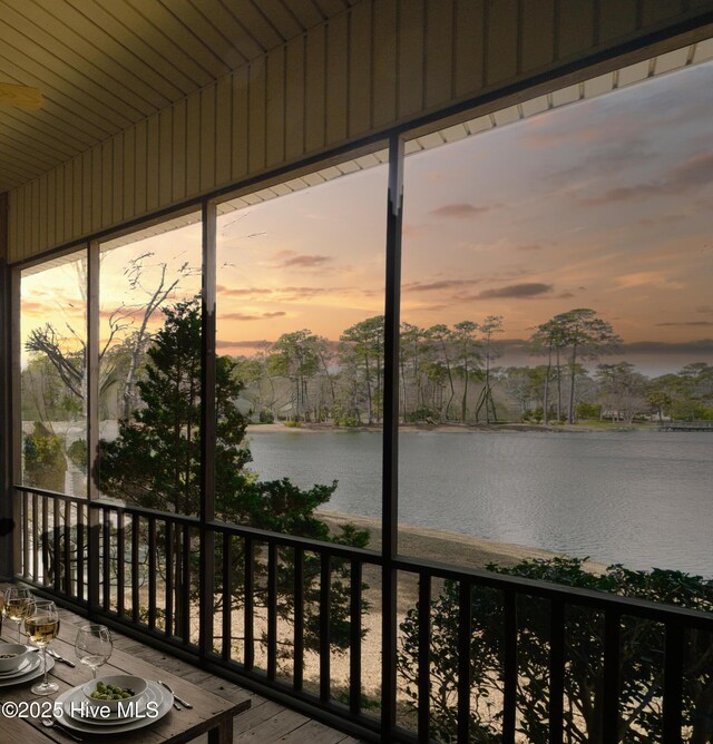 155 Abbington Pl SW, Ocean Isle Beach, NC 28469 - unfurnished sunroom with a water view and plenty of natural light