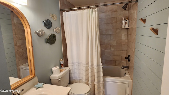 full bath featuring toilet and shower / bath combination with curtain