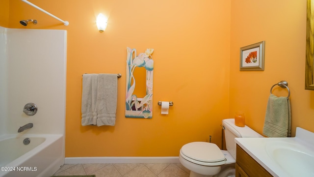 full bathroom with toilet, vanity, shower / tub combination, tile patterned flooring, and baseboards