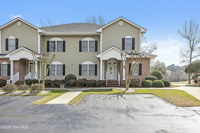 view of front of property with brick siding