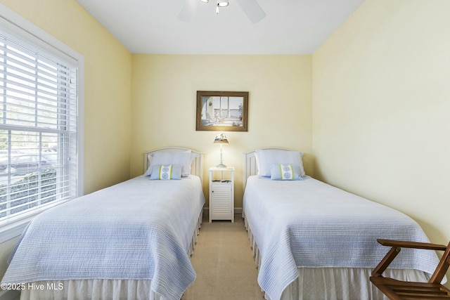 bedroom featuring carpet floors and ceiling fan