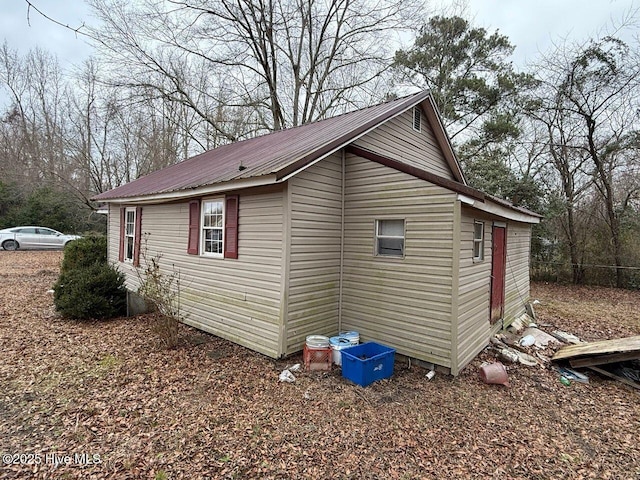 view of home's exterior with metal roof