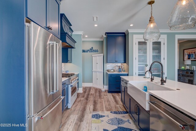 mudroom featuring wood finished floors and baseboards