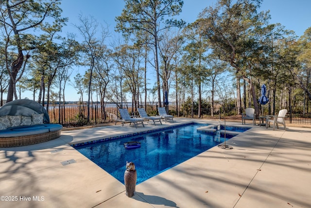 view of pool featuring a fenced in pool, a patio, and fence