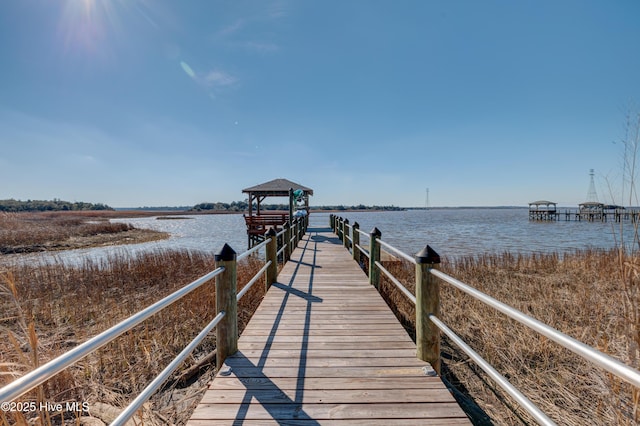 view of dock with a water view