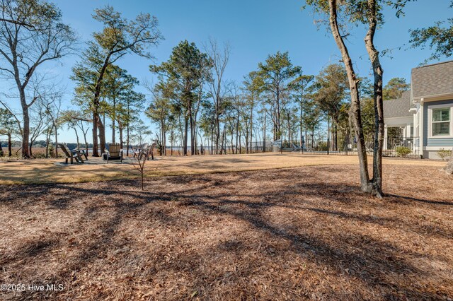 view of front of house featuring fence