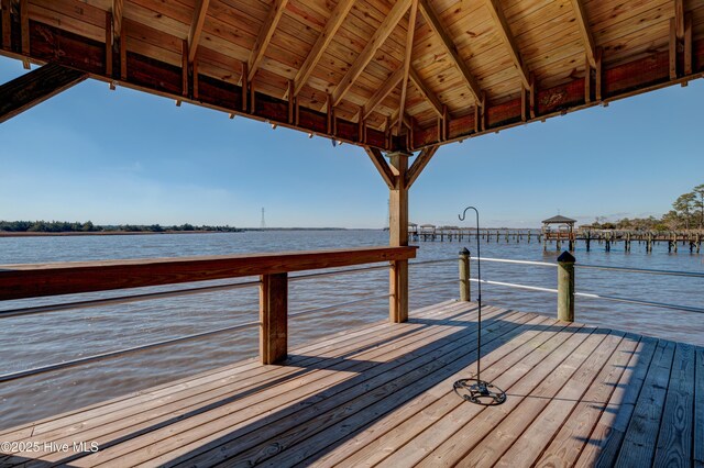 dock area featuring a water view and a gazebo