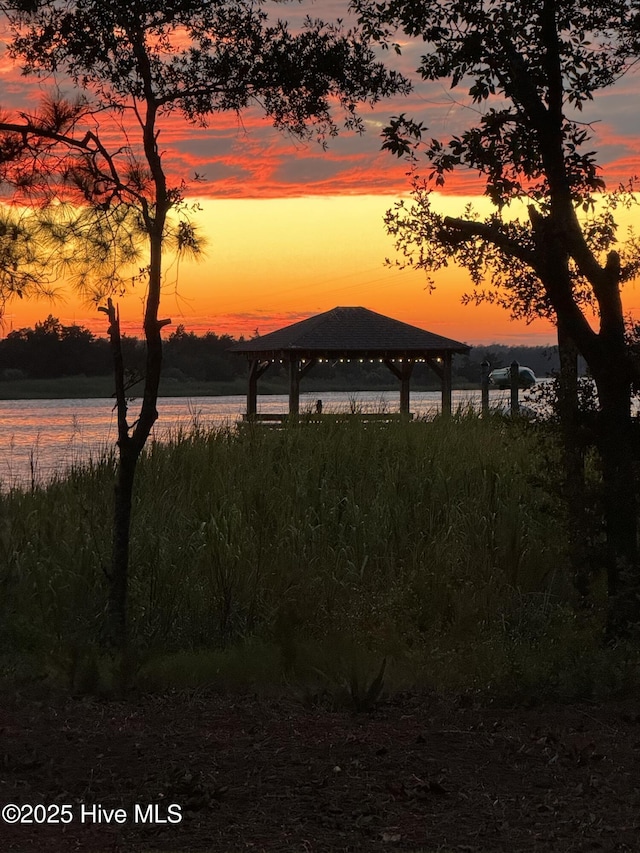 property view of water with a gazebo