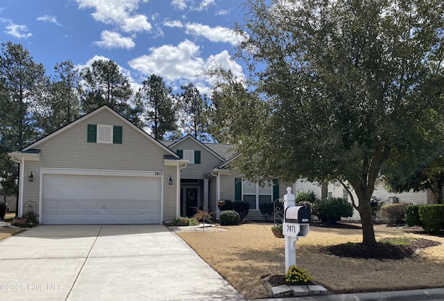 view of front facade featuring a garage and driveway