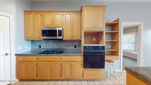 kitchen featuring black appliances, light tile patterned flooring, decorative backsplash, and open shelves
