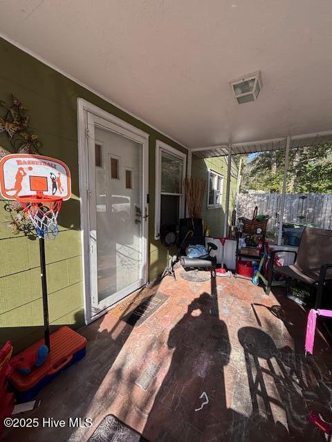 view of patio with fence