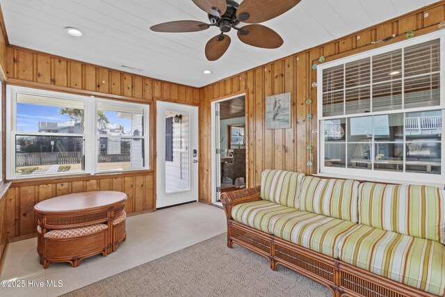 sunroom / solarium with ceiling fan