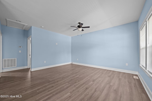 105 Bryan Pl, Washington, NC 27889 - unfurnished room featuring wood finished floors, attic access, ceiling fan, and baseboards