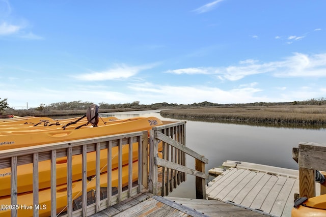 dock area featuring a water view