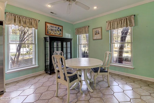 dining space featuring light tile patterned floors, baseboards, visible vents, crown molding, and recessed lighting