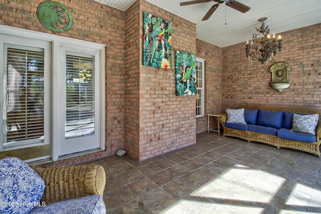 interior space featuring ceiling fan and outdoor lounge area