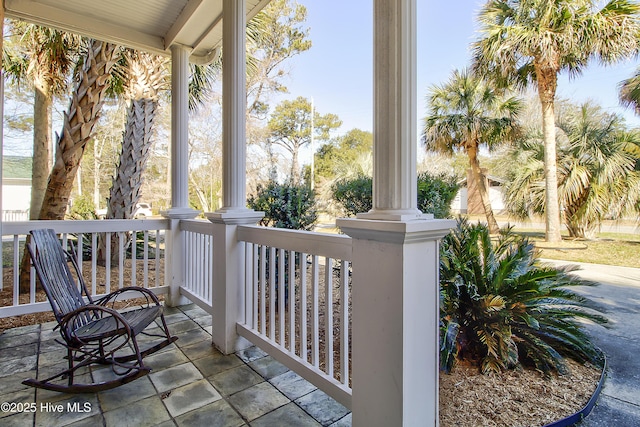 balcony featuring a porch