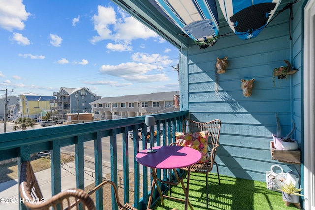 balcony featuring a residential view