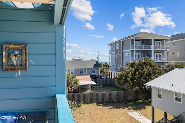 view of yard with a garage and fence