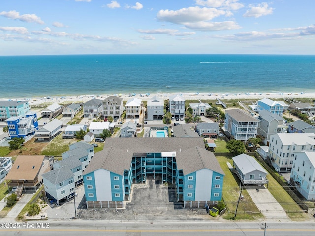 bird's eye view featuring a water view and a residential view