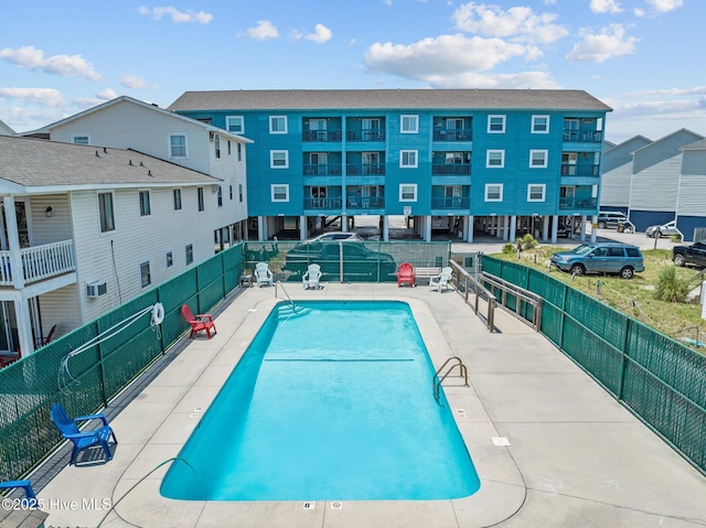 community pool with fence