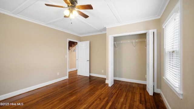 unfurnished bedroom with ceiling fan, baseboards, a closet, dark wood finished floors, and crown molding