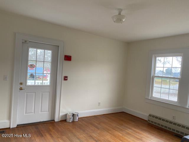 unfurnished bedroom featuring carpet floors, visible vents, baseboards, vaulted ceiling, and a closet