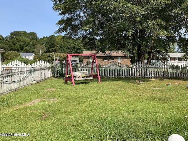 view of yard featuring fence