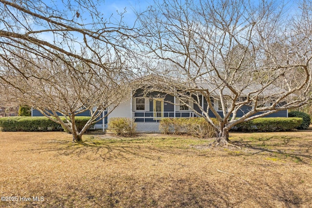 exterior space with a sunroom