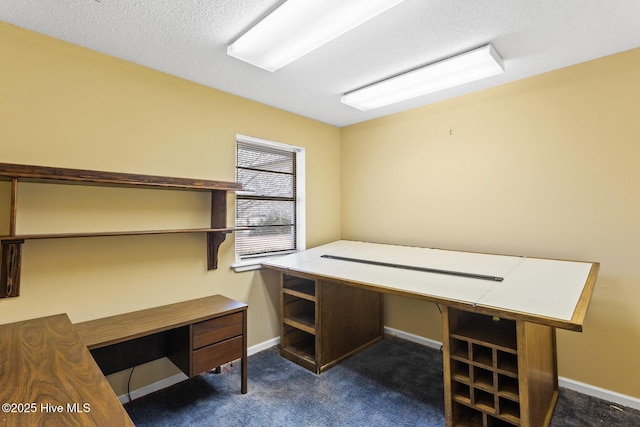 home office with dark carpet, a textured ceiling, and baseboards