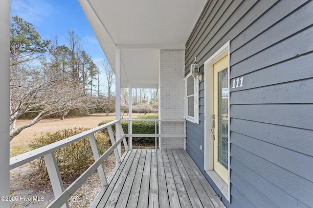 wooden deck featuring a porch