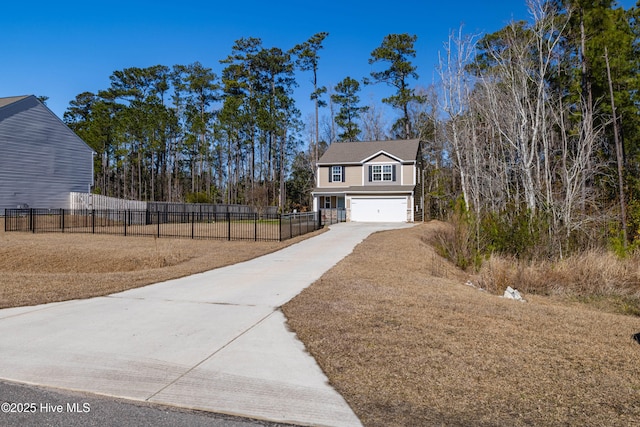 view of front of property featuring concrete driveway, fence, and an attached garage