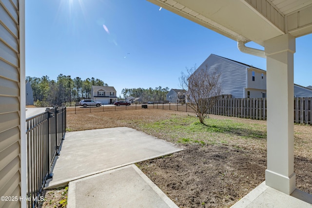 view of yard with a patio area and fence