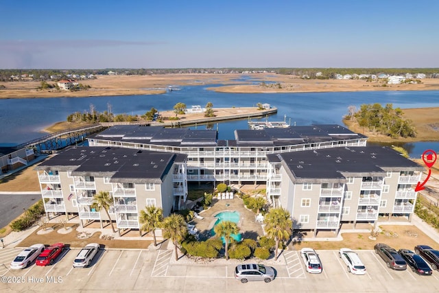 drone / aerial view featuring a water view