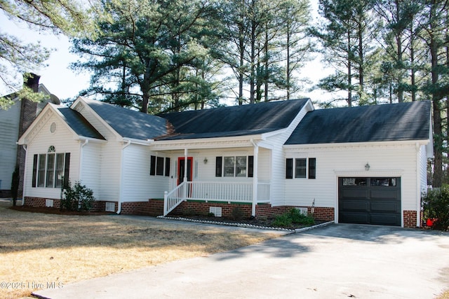 ranch-style home with driveway, a garage, a chimney, crawl space, and a porch