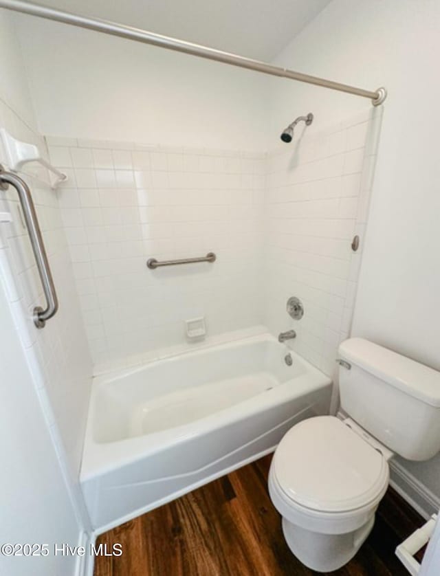 bathroom featuring shower / tub combination, toilet, and wood finished floors