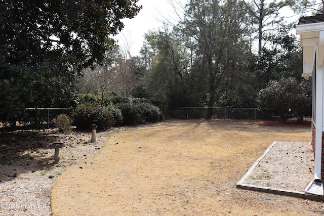 view of yard with fence