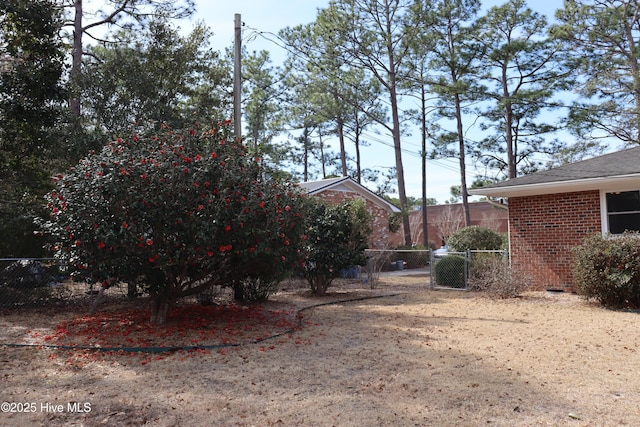 view of yard featuring fence