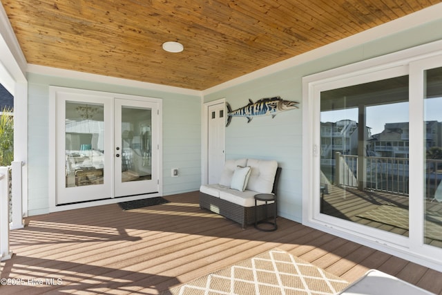 wooden terrace featuring french doors