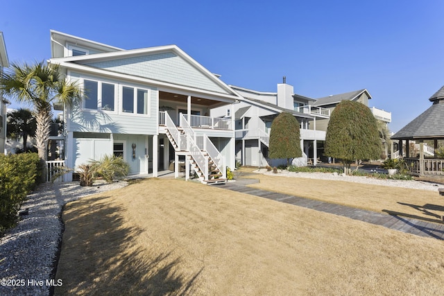 coastal inspired home featuring stairs