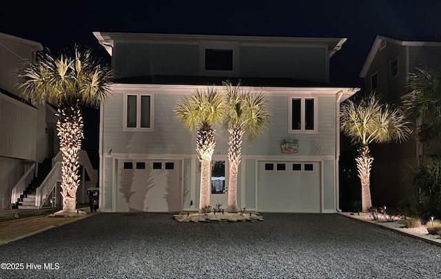 view of front facade featuring driveway and a garage