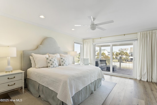 bedroom with access to outside, light wood-style floors, recessed lighting, and crown molding